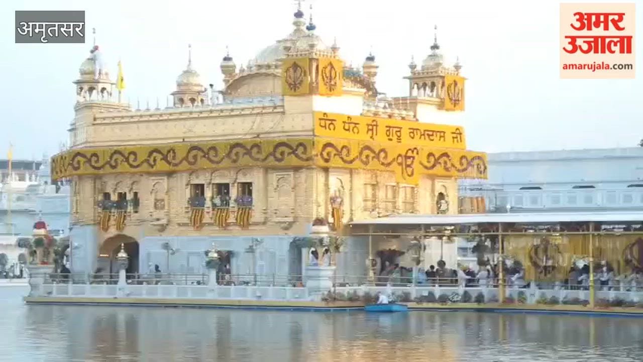 Harmandir Sahib adorned with flowers on the occasion of the first Parkash Purab of Sri Guru Granth Sahib Ji.