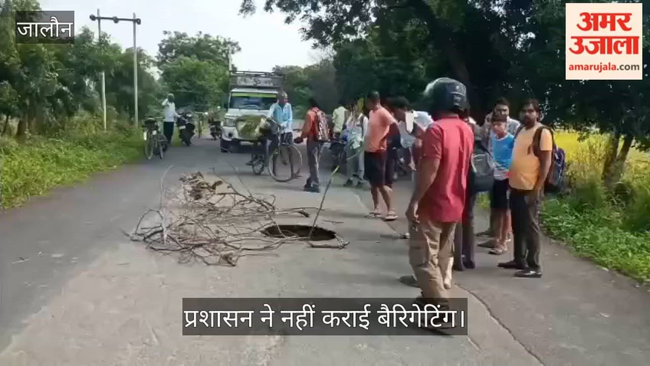 Deep pothole on main road poses accident risk; safety measures missing on Umri-Navar Road.