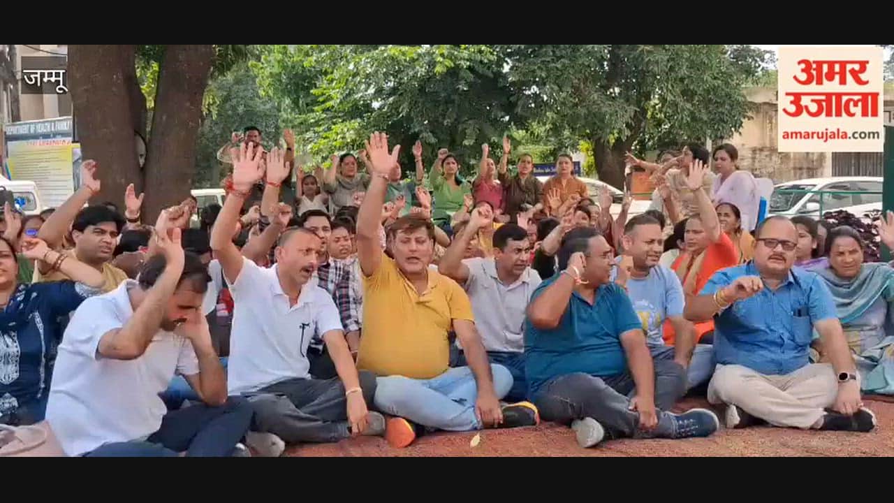 NHM employees stage a protest over their demands at the Samba District Hospital complex