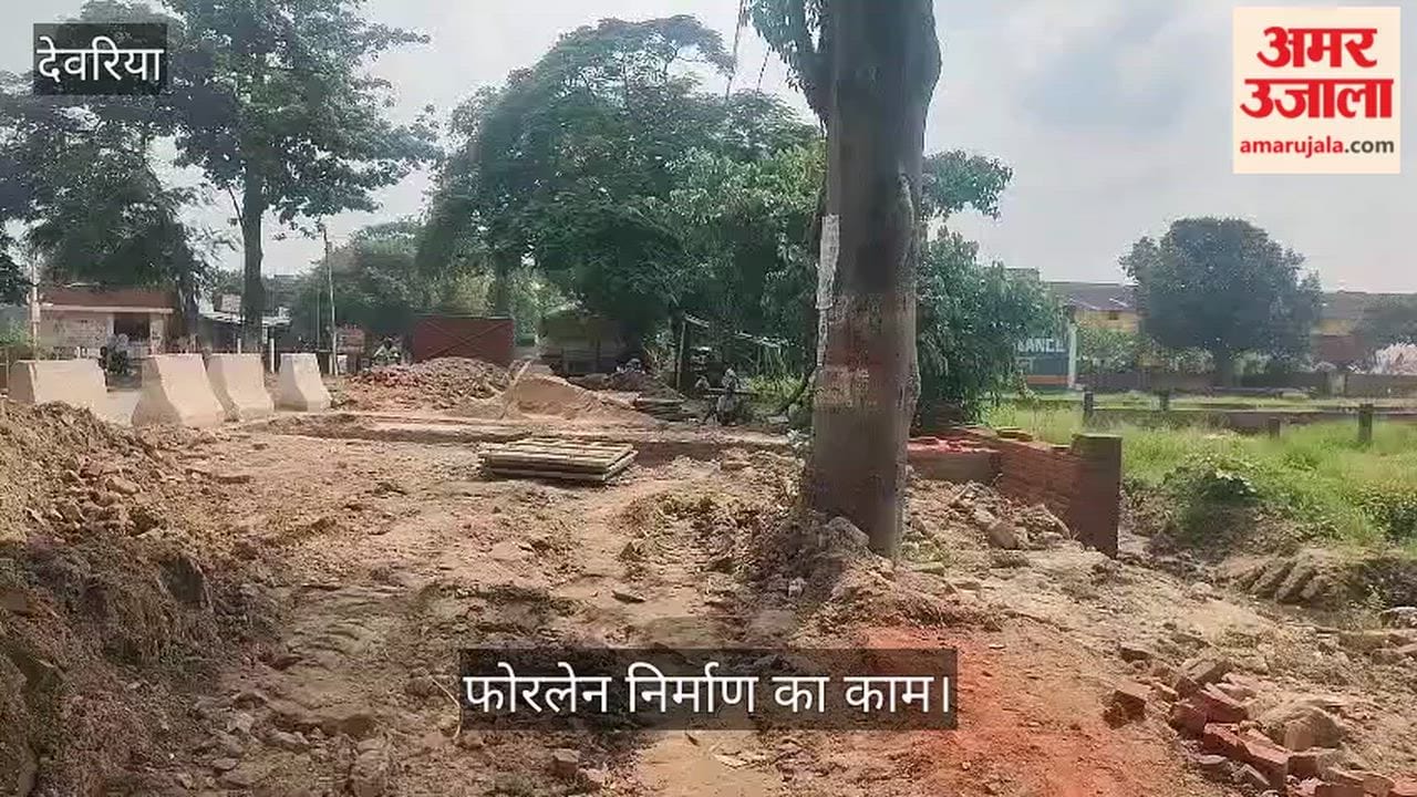 Construction work is being carried out on half the road, while traffic continues on the other half.