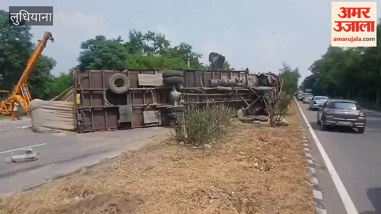 A truck loaded with wheat straw overturned on the Baddowal National Highway in Ludhiana.