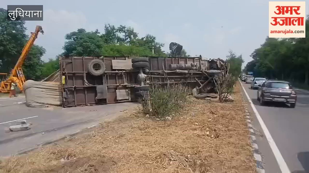 A truck loaded with wheat straw overturned on the Baddowal National Highway in Ludhiana.
