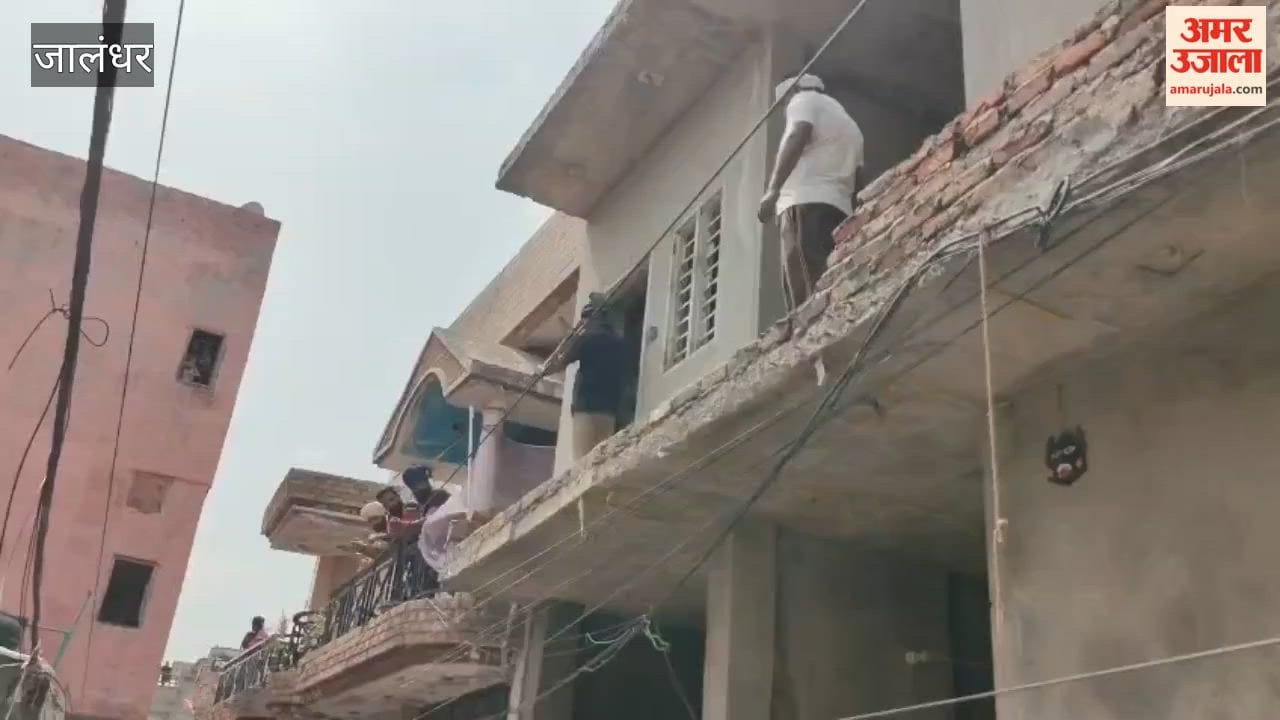 Bulldozer used on drug smuggler's house in Jalandhar.