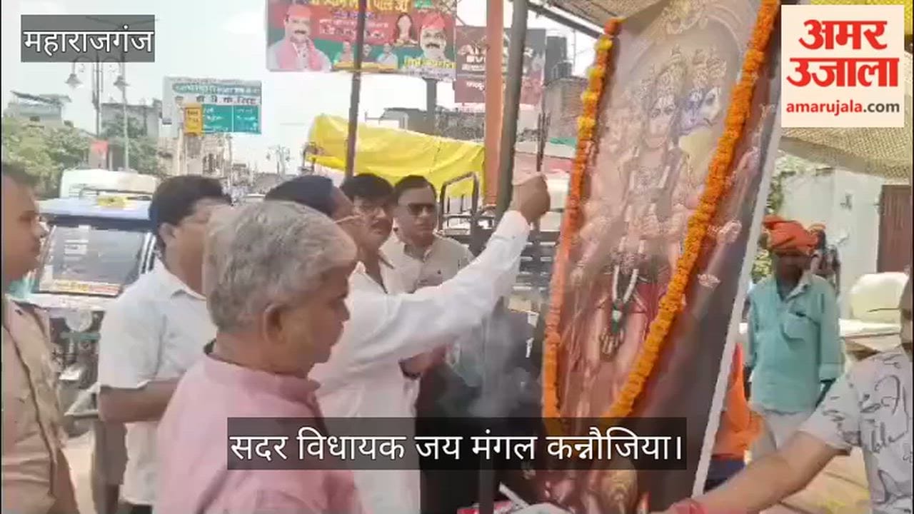 Devotees thronged the *prasad* distribution; the MLA distributed the *prasad*.