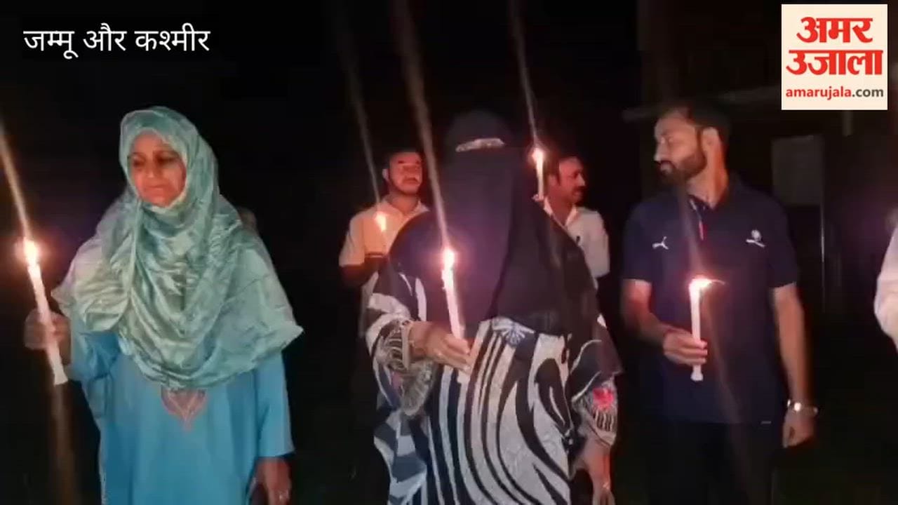 NHM employees held a candle march in Ganderbal, intensifying their ongoing protest over their long-pending demands.