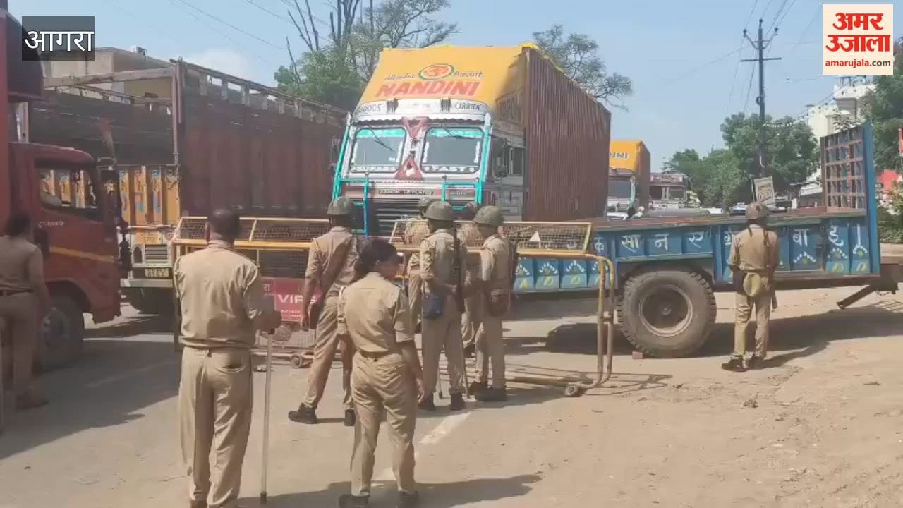 Protest against UGC police set up barricades to stop protesters traffic jam on Hathras route