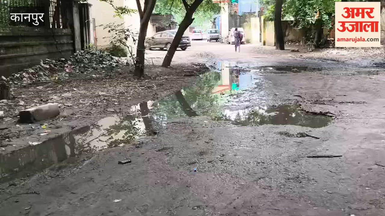 Dilapidated conditions outside the old CMO office building; sewage water floods the road