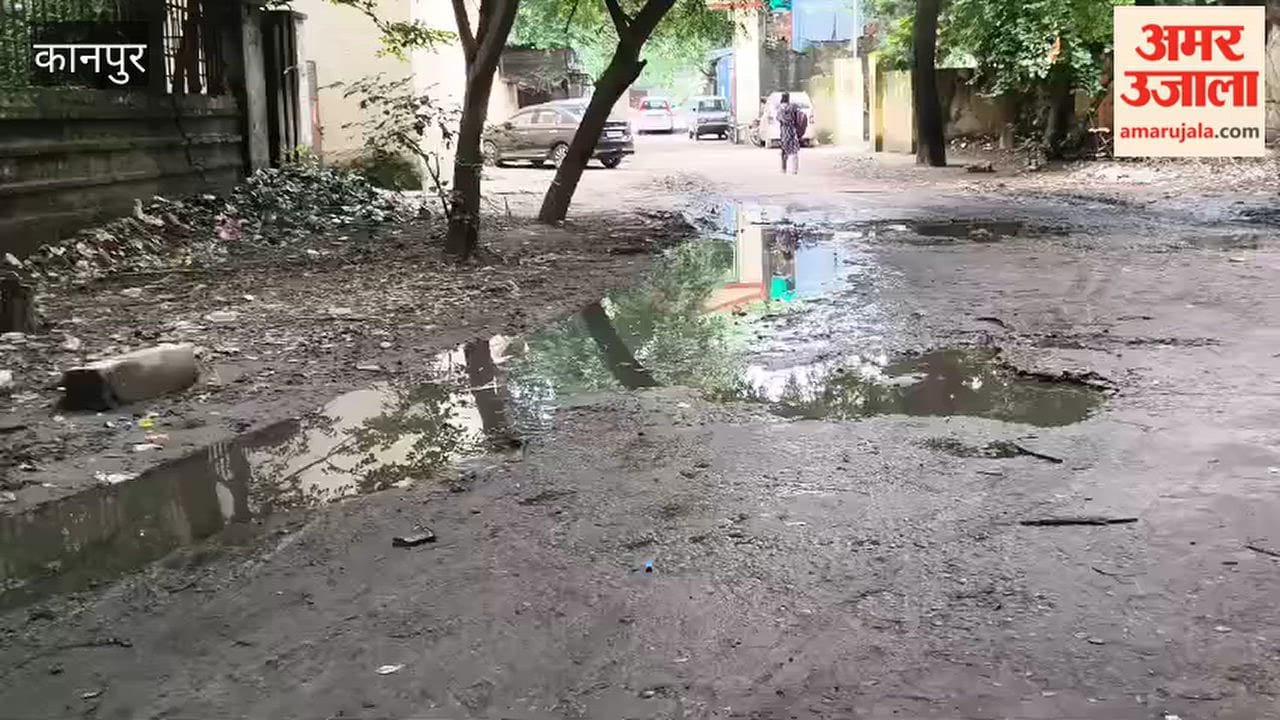 Dilapidated conditions outside the old CMO office building; sewage water floods the road