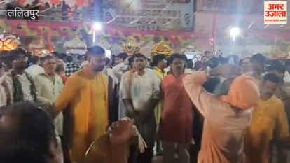 The deity's procession through the city amidst heavy rain; grand *Maha-Aarti* of the *Vimanas* performed from 12 bastions.