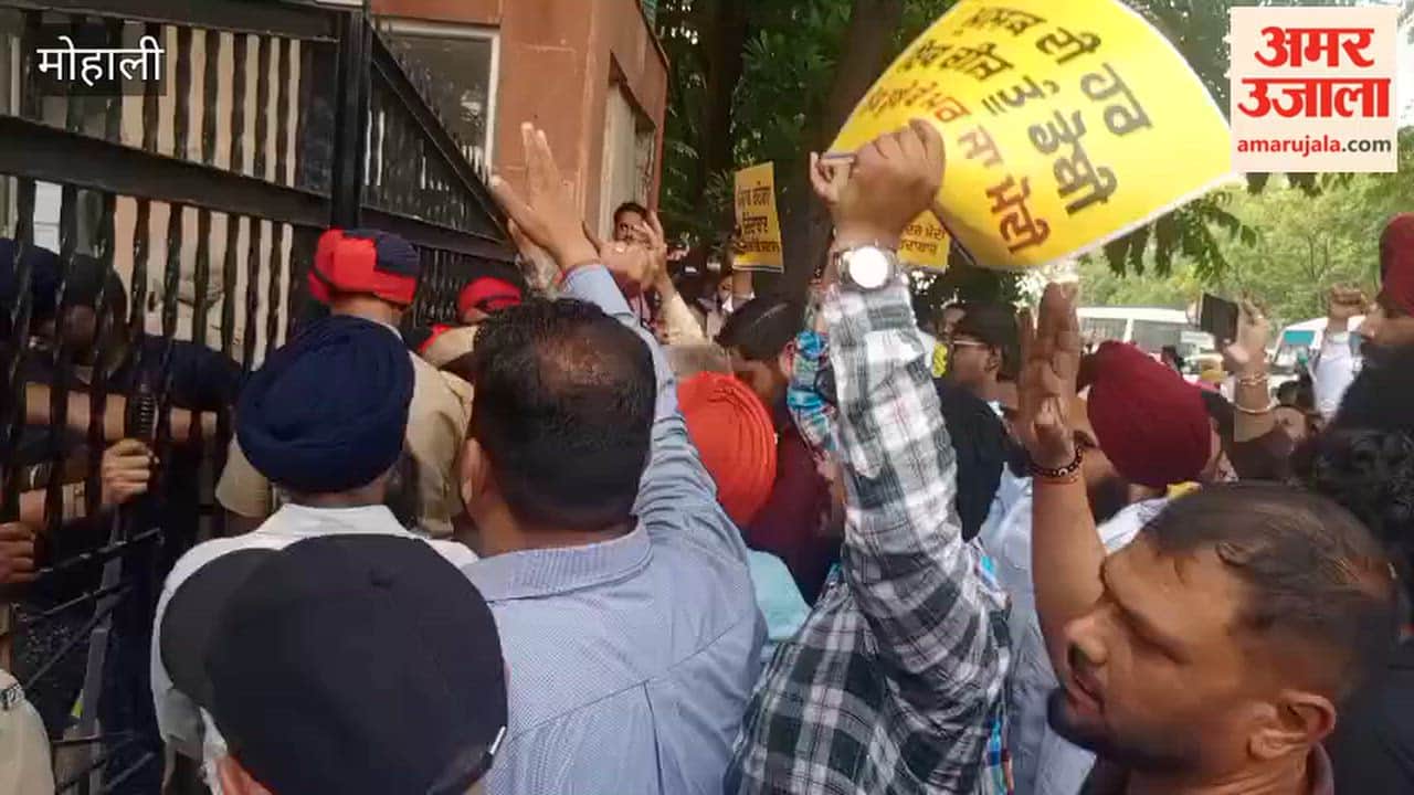 AAP fumes over ED raid in Mohali; protests outside GMADA office.
