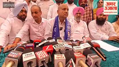 Karmveer Bauddh holds a press conference in Jalandhar, targeting the BJP over inflation and the drug menace; questions also raised regarding MP Channi's absence.