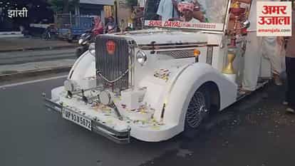 Lord Ganesha's immersion procession taken out in a vintage car.