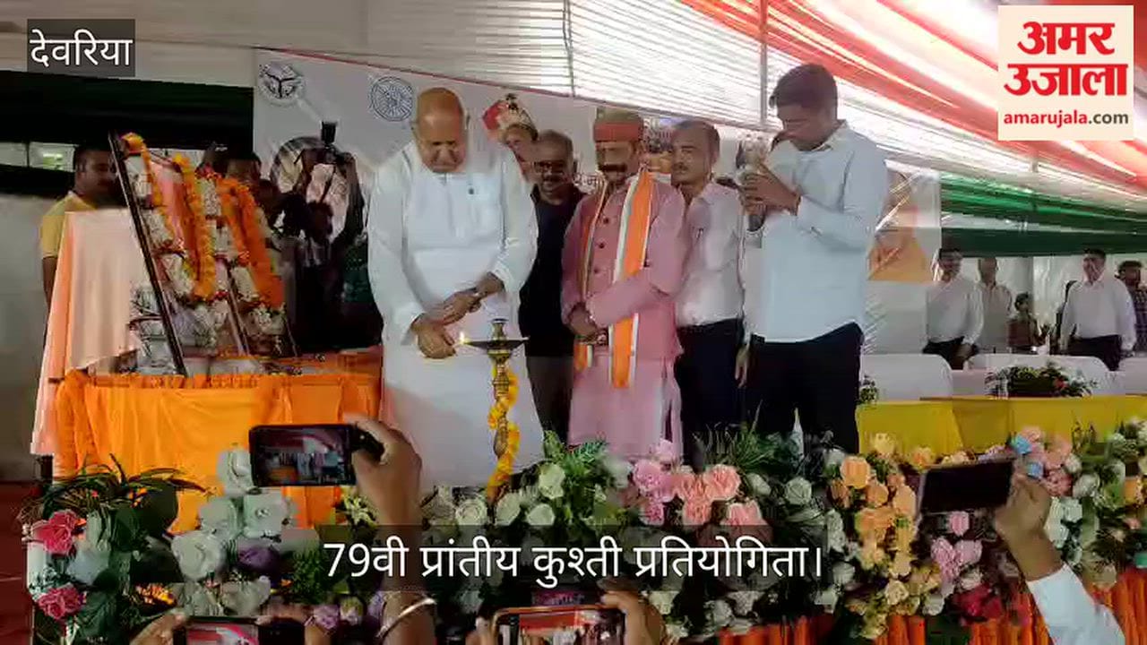Agriculture Minister inaugurates 70th Provincial Wrestling Competition by lighting the ceremonial lamp.
