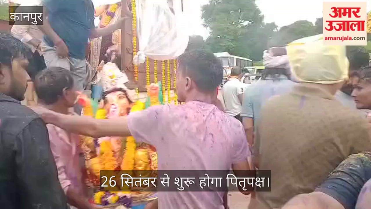 Kanpur Chants of Ganpati Bappa Morya Echo at Siddhnath Ghat Devotees Undeterred by Rain