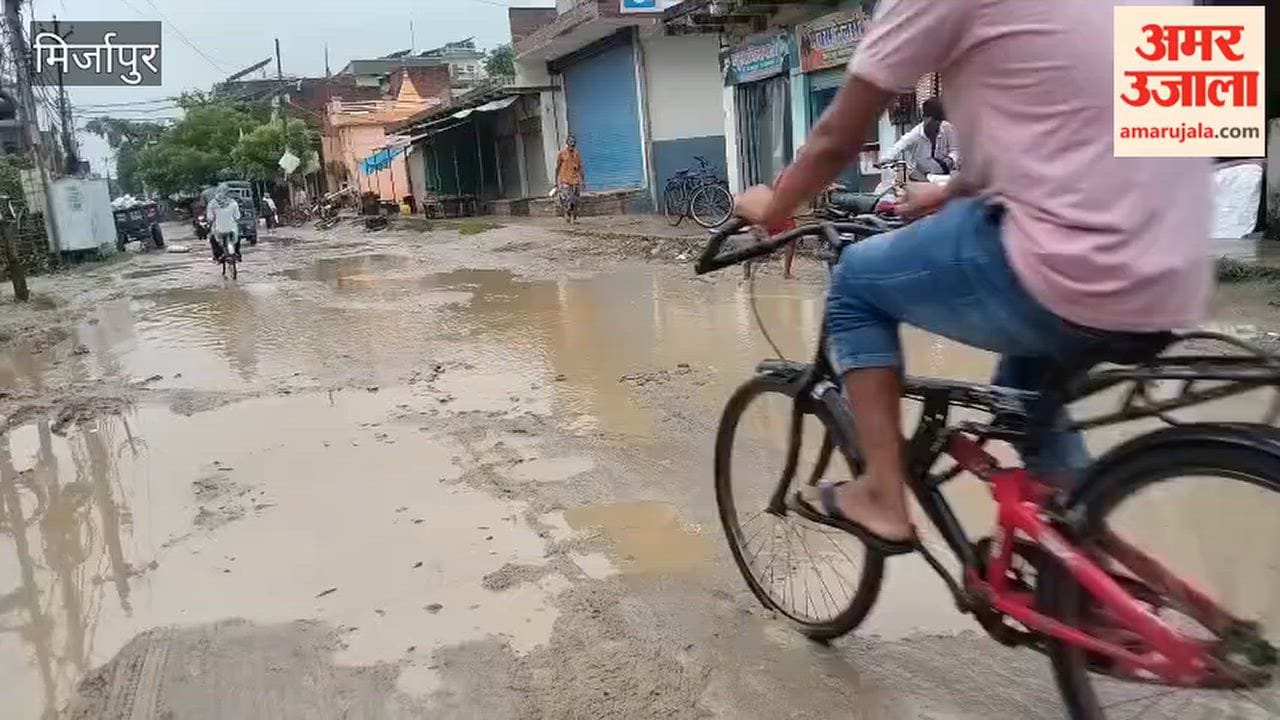 Water accumulates in potholes on the paved roads of Pokhara, increasing woes for commuters