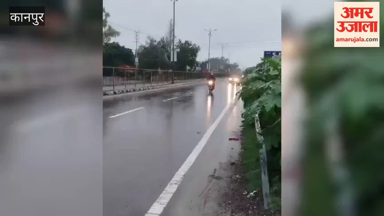 Kanpur: Motorists seen driving through heavy rain on Naubasta-Hamirpur Road