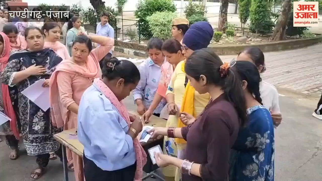 Strict checking during the Lecturer cadre exam at the Government School in Chandigarh's Sector 10.