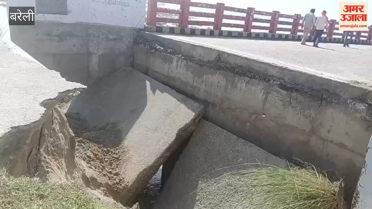 Road near Ramganga River bridge caves in