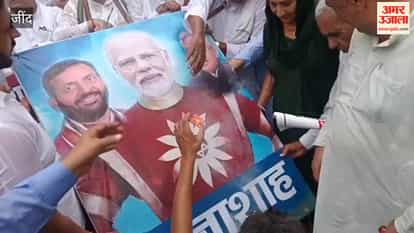 Congress protests in Jind amidst rain; effigy of Chief Election Commissioner burnt.
