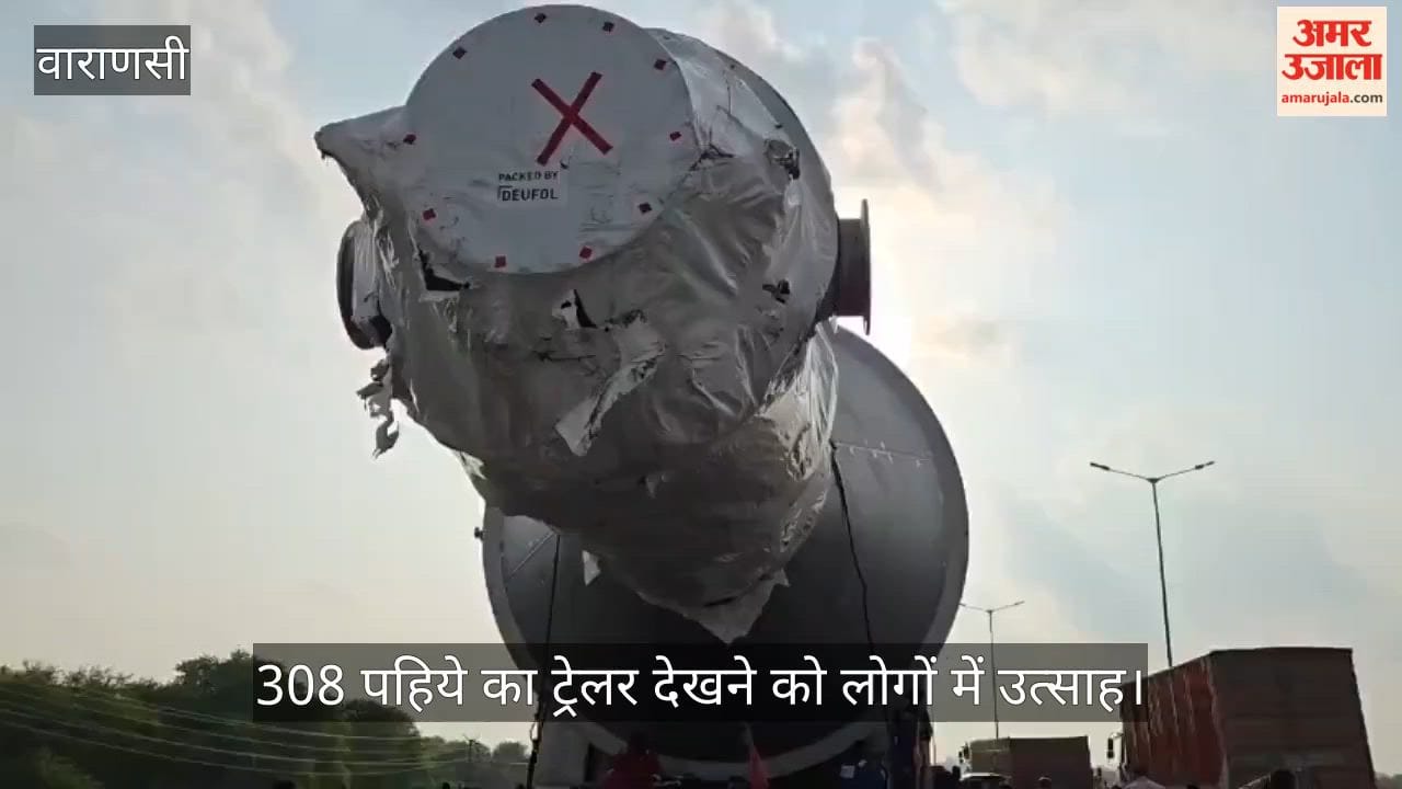 team of 100 employees and 14 vehicles accompanying 308-wheel trailer in varanasi