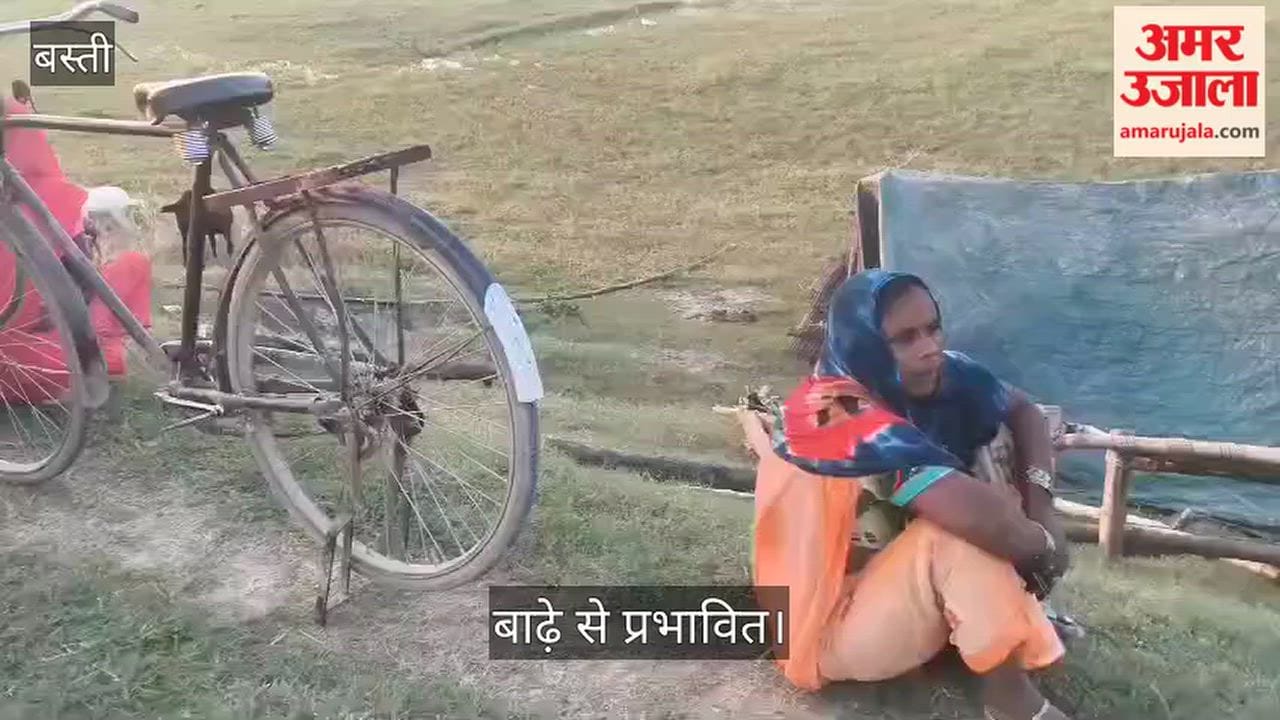Fearing erosion by the Saryu River, villagers gathered on the embankment.