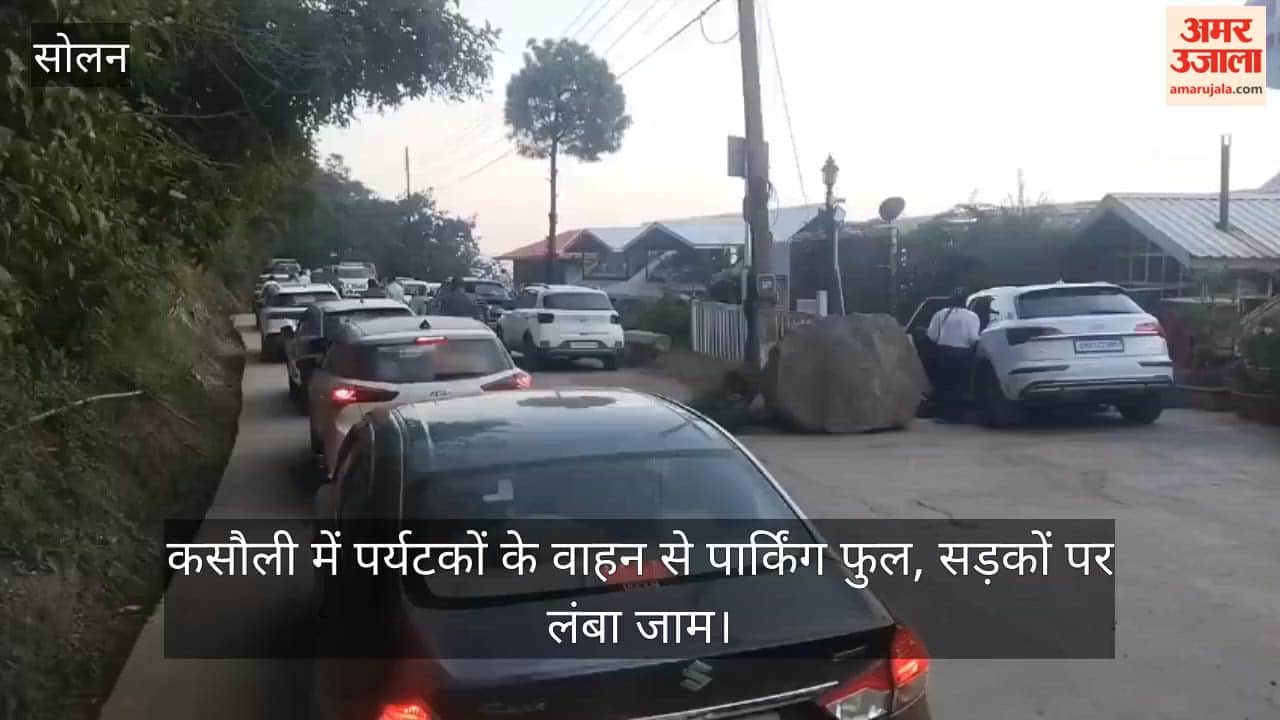 Parking in Kasauli full with tourist vehicles; long traffic jams on the roads.