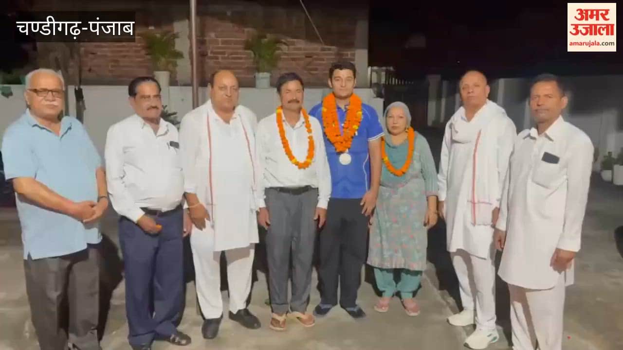 International wrestler Nirmal Singh Asafpur honored medal winner Neeraj Kumar and his parents.