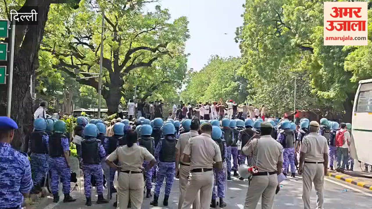 INDIA Bloc March Several opposition leaders, including Rahul Gandhi, climbed the barricades