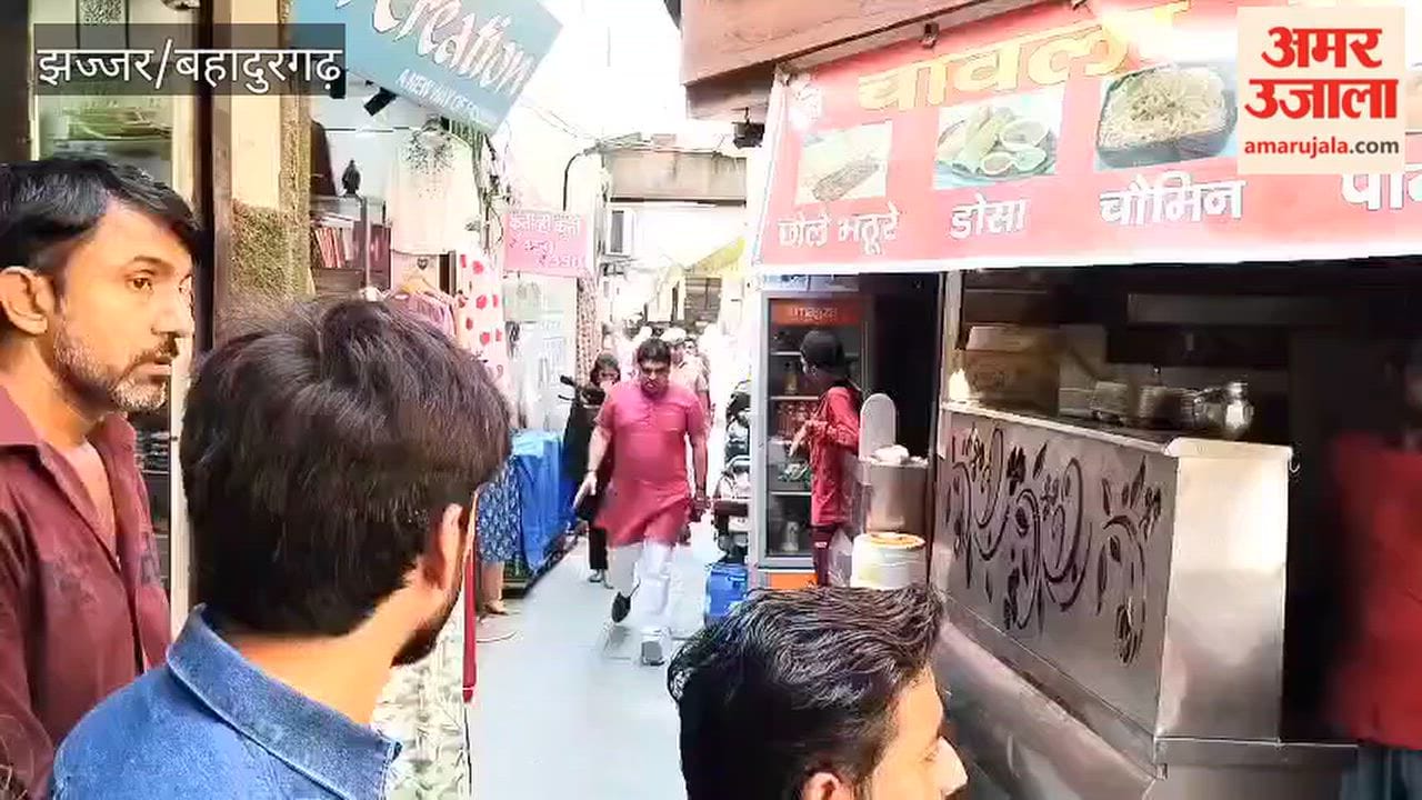 DC visits Shiva Market; assures shopkeepers of action.