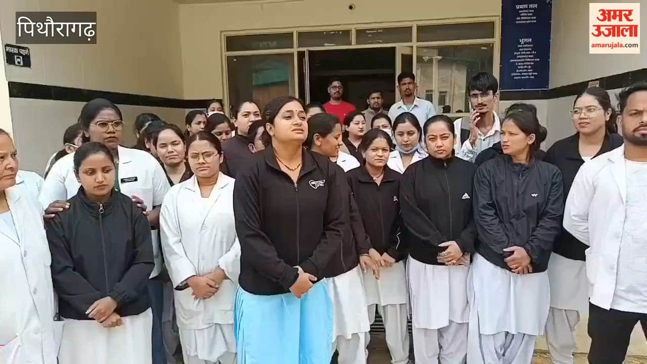 Outsourced nursing officers staged a protest demanding equal pay.