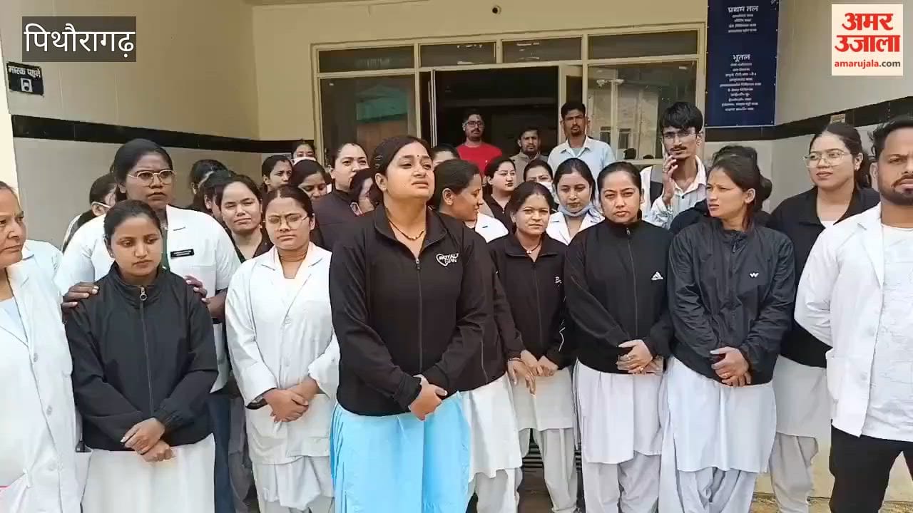 Outsourced nursing officers staged a protest demanding equal pay.