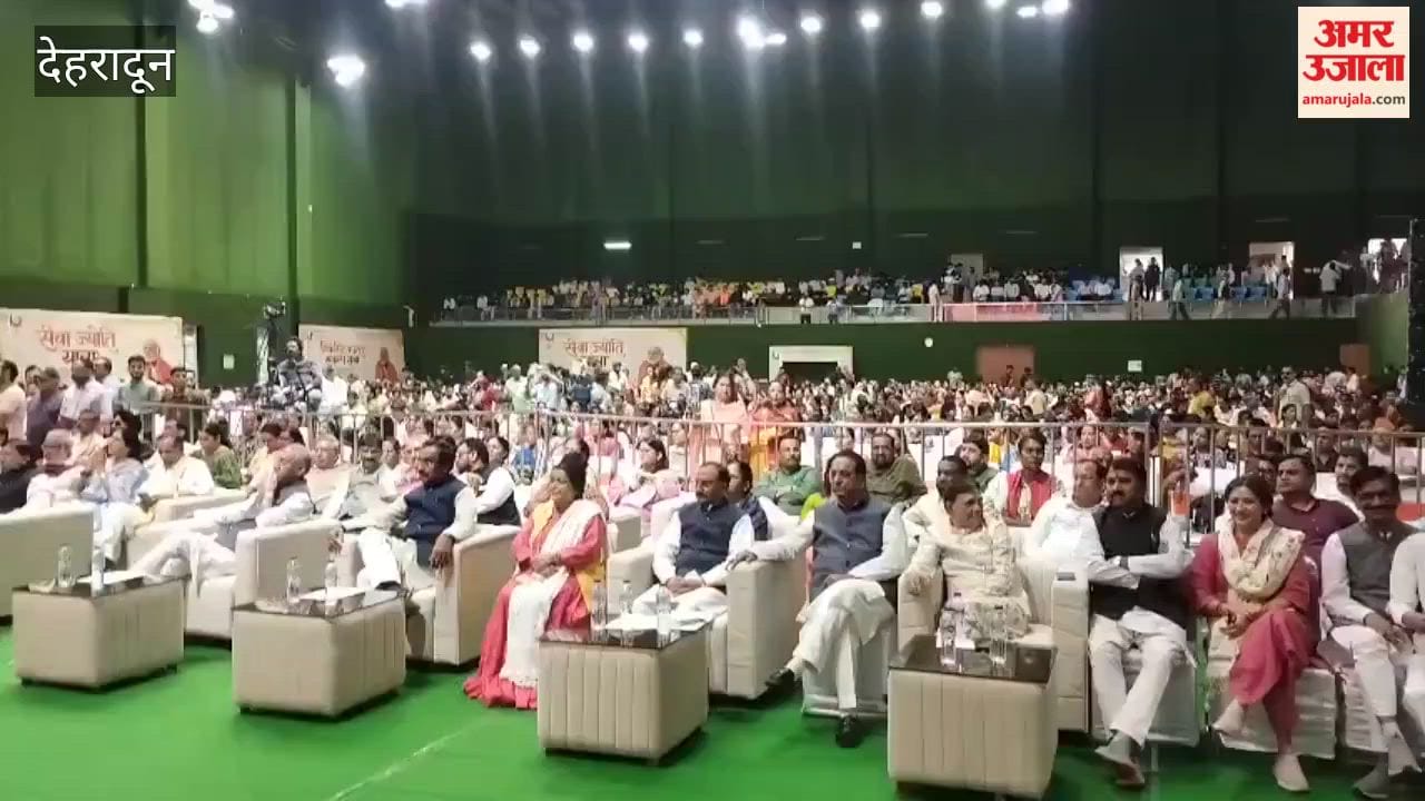 BJP workers rally for Seva Jyoti Yatra event organized to mark PM Modi  25-year pledge of service Dehradun
