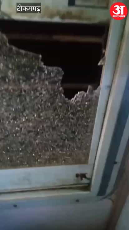 Train pelted with stones; windowpanes shattered, passengers injured.