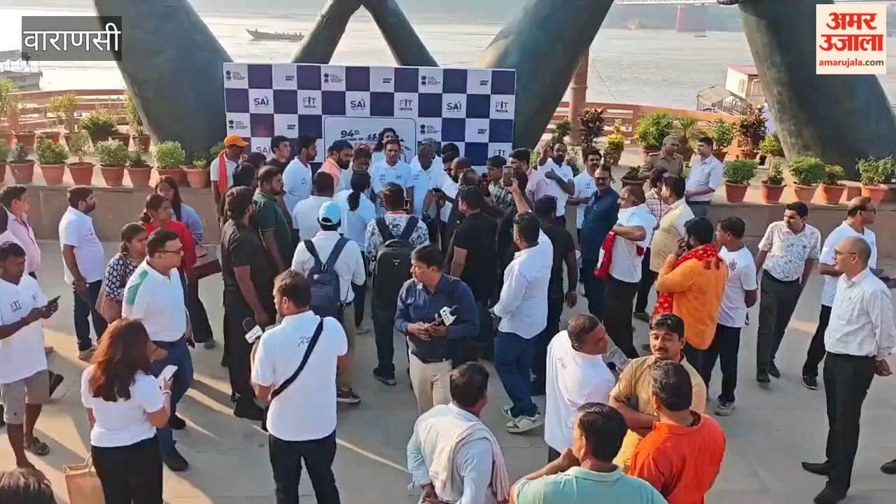 Union Minister Mansukh Mandaviya cycles with youth at Namo Ghat