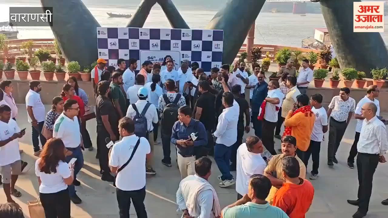 Union Minister Mansukh Mandaviya cycles with youth at Namo Ghat