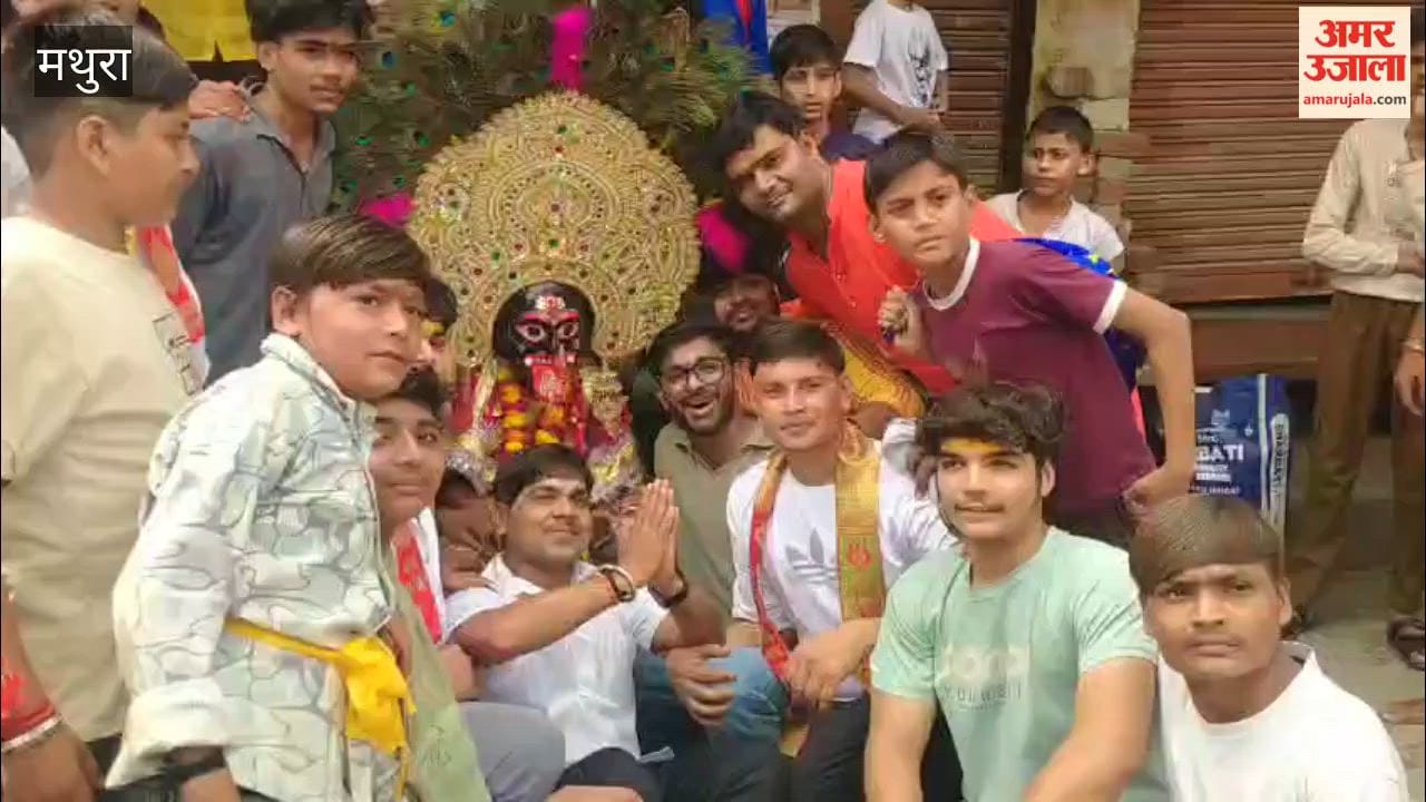 Grand 'Kalash Yatra' held prior to the installation of Goddess Bhagwati; flowers showered upon the procession Women marched carrying 251 sacred pots; devotees danced with joy