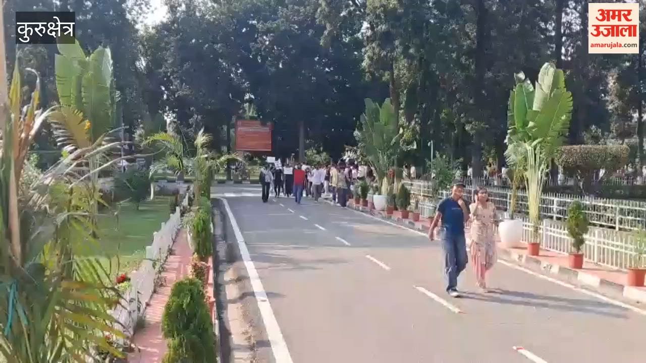 Students and teachers at Kurukshetra University took to the streets to protest the assault on a professor, blocking the area outside the Vice-Chancellor's office.