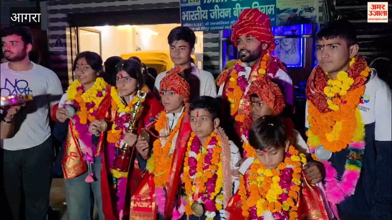 Upon their return from Bhutan, the sons and daughters who won gold and silver medals were welcomed with a *tilak* and *aarti*, and adorned with flower garlands.