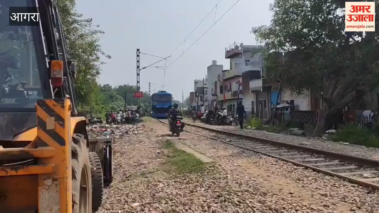 Bike Riders Risk Lives as Barah Khamba Railway Crossing Closes for ROB Work