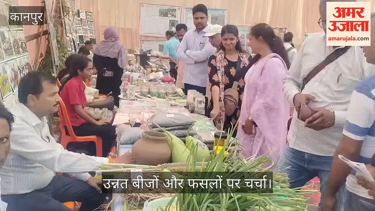 Kanpur CSA Farmers Fair farmers and students explore information on fruits vegetables and grains