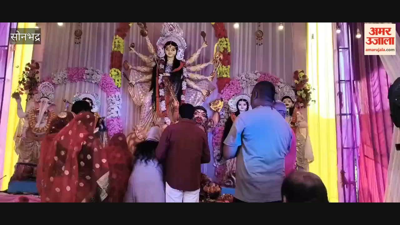 Devotees feel blessed after offering prayers and seeking blessings puja pandals Maha Ashtami