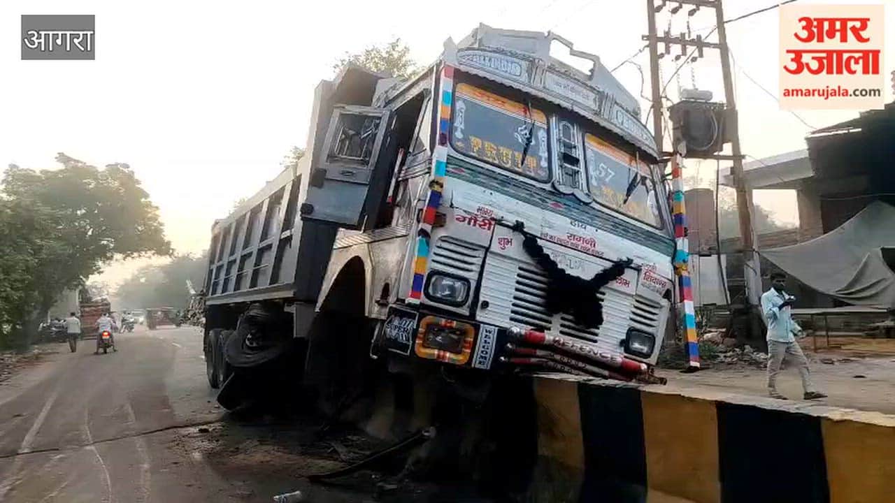 trucks overturned and ended up on road divider drivers had narrow escape