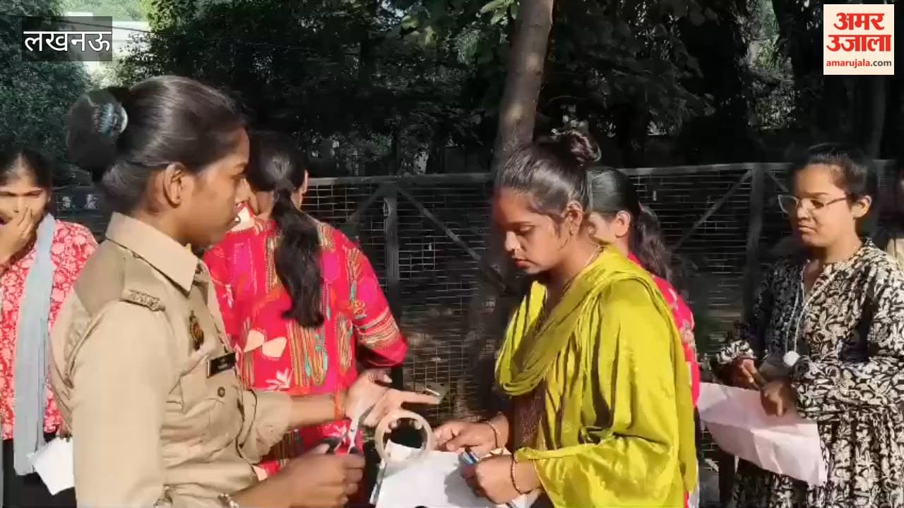 Strict checking for UP PET exam in Lucknow students remove their shoes and also had their sacred thread cut