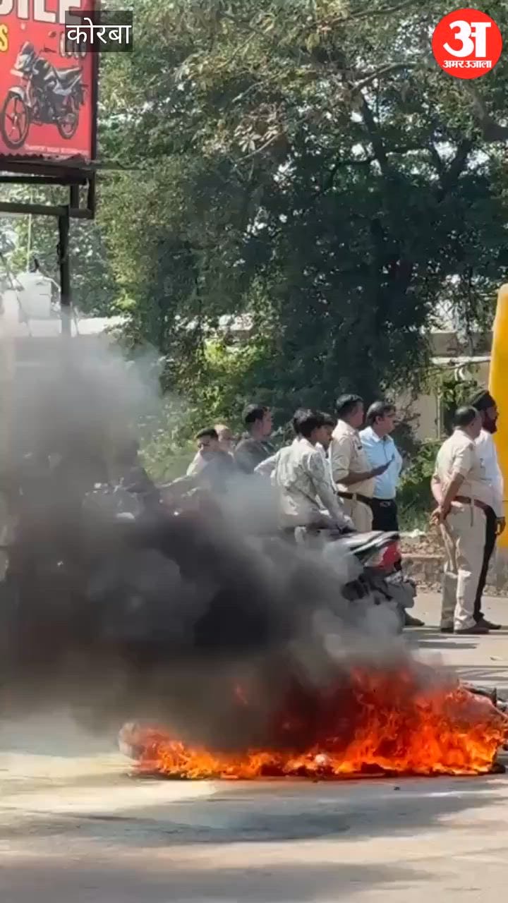 Pulsar bike catches fire during repair atKorba garage, panic ensues, bike dragged to road, fire brigade douses