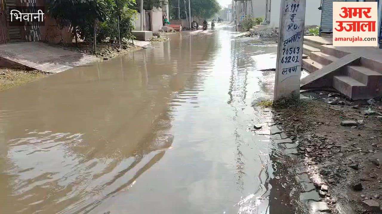 Dhana Road in Bhiwani turns into a river due to a clogged sewer; traffic disrupted.