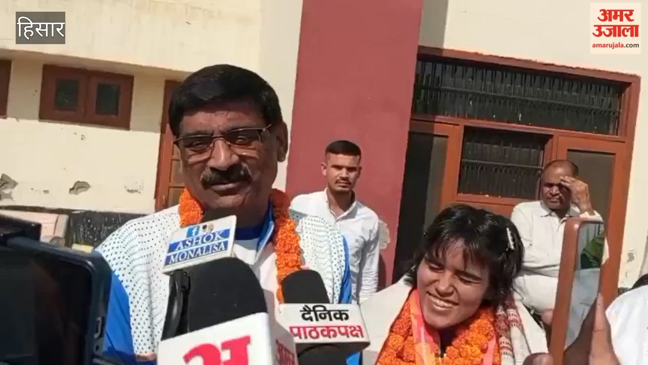 Kokila honored in a ceremony for winning a silver medal in the Para Judo competition.